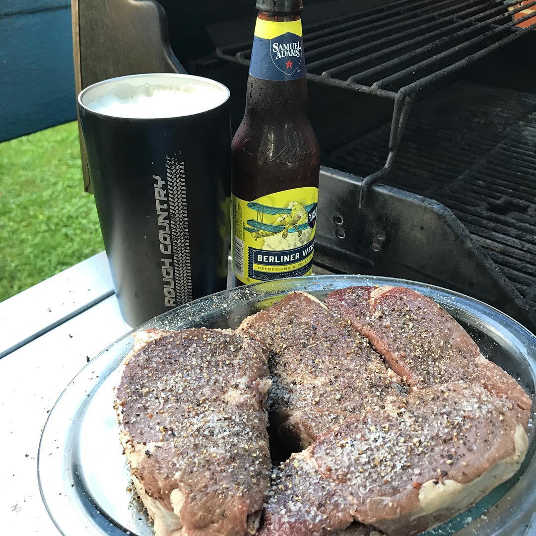 4th of July Grillin’ time. @samueladamsbeer in a @roughcountry tumbler and filets as big as roasts. #MURICA